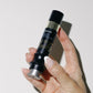 Intuisse Active NAD+ Eye Serum held in hand, showing its size