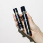 Intuisse Active NAD+ Face Serum and Eye Serum held in hand